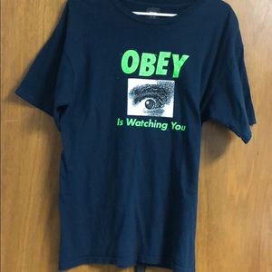 Obey is watching you tee
